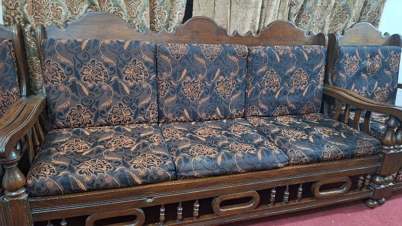 Pure old wooden sofa set with golden cutions is up for sale 1