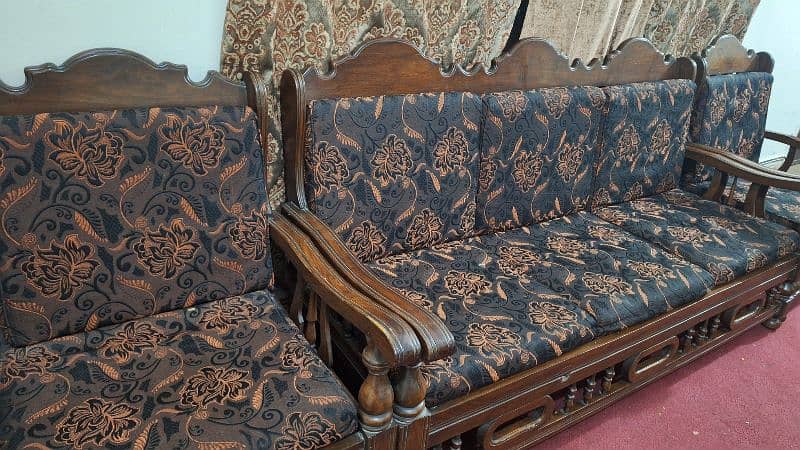 Pure old wooden sofa set with golden cutions is up for sale 2