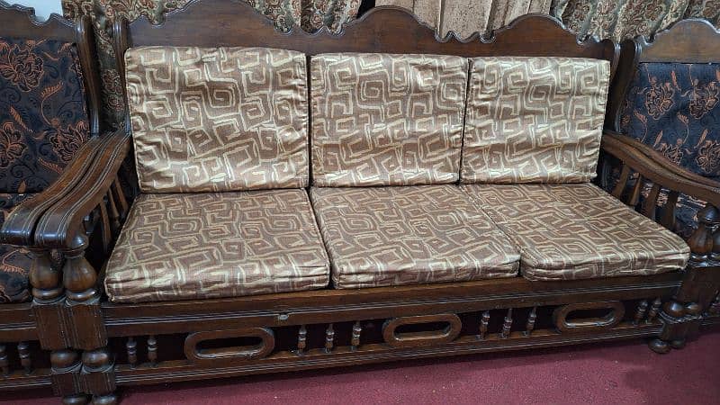 Pure old wooden sofa set with golden cutions is up for sale 4