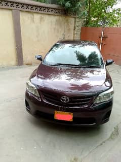 Toyota Corolla GLI 2012 urgent sell red wine original car 0