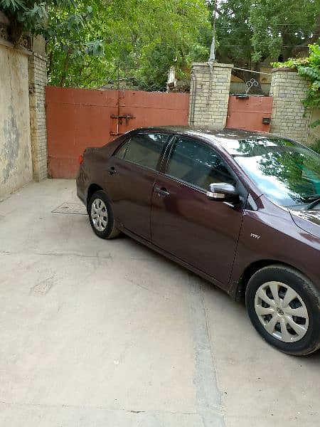 Toyota Corolla GLI 2012 urgent sell red wine original car 2