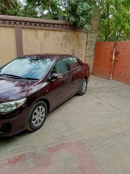 Toyota Corolla GLI 2012 urgent sell red wine original car 3