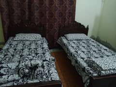 Walnut wood bed available for sale price is negligible