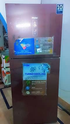 refrigerator is look like new brand name HAIER