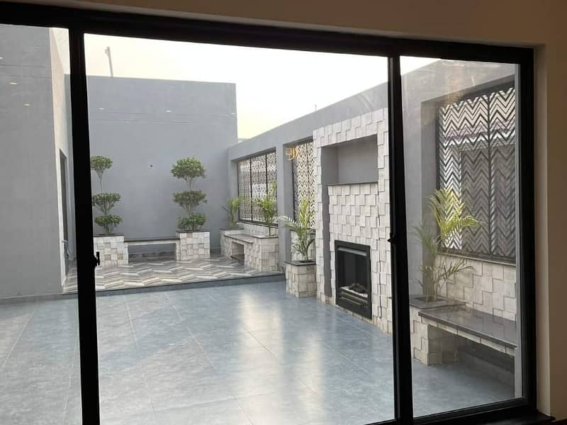 1 KANAL HOUSE For Rent In DHA EME SOCIETY LAHORE 5 Master Bedroom With Furnish AC 2 Kichan Driang Room Dining 2 TV Launch Store Powdar Washroom Servant Questar Garage Terrace Lundreye 12