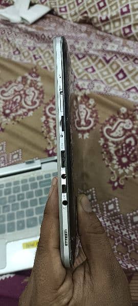 selling a laptop which makes it become a  tab 8