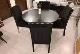 Dinning table and different items for sale.