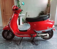 Ramza petrol scoty 100cc registered  2024