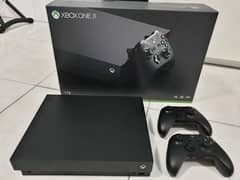 Xbox one x 1tb with two controllers