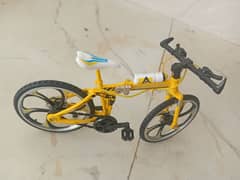 Foldable bicycle toy