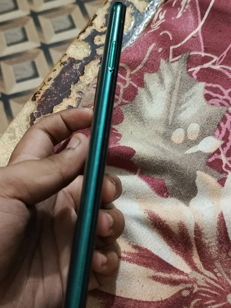 Infinix note 7 in green color 2