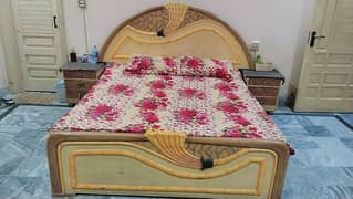 pure wooden double bed with two side table