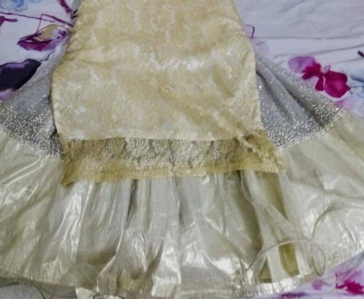 Golden and white Stitched lehnga with shirt size S-M for teen girls. 1