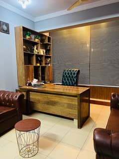 Executive table with wall-mounted cupboard