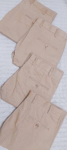 Trousers Chino pants stock for sale 3