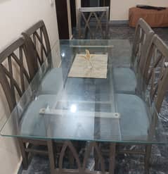 Six month used dining table with 6 chairs