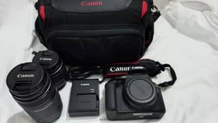 FRESH Canon EOS 2000D with 18-55 lens and 75-300 mm lens