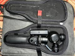 DJI osmo camera with device holder