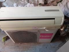 split Ac 1 TON Haier Company geninun gas compasyer