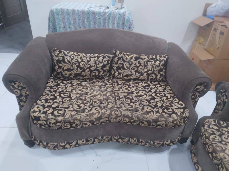 4 seater Sofa with glass table 1