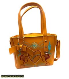 woman's Rexine Embroidered hand bag for sale