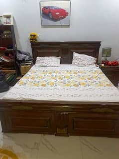 used Wooden bedroom set available for sale in good condition.