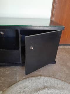 Selling my LED TV Trolley on urgent basis with top glass 5mm.