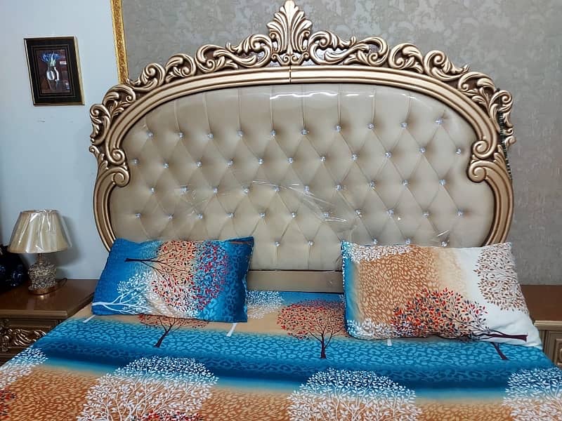 king size bed with 2 side tables and dressing table 7