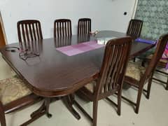 Wooden dinning table with 8 chairs 0