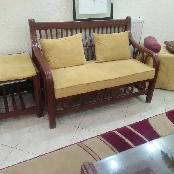 7 seater wooden sofa in excellent condition 0