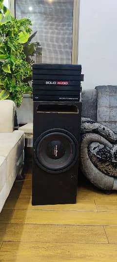 Solid Audio 5500 watt amp and Woofer