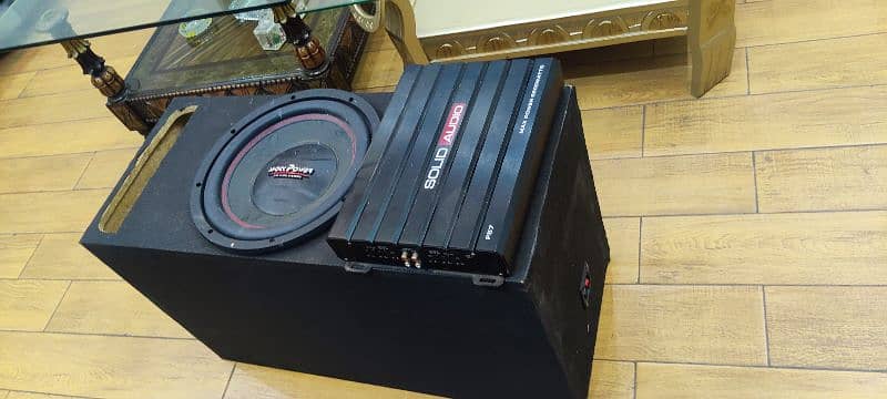 Solid Audio 5500 watt amp and Woofer 1