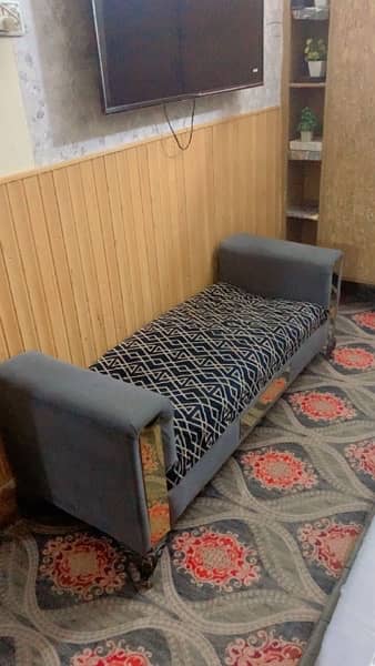 2 seater sofa hai gray and black 2