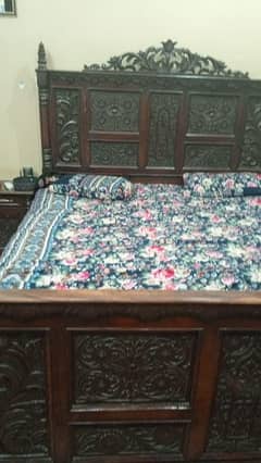 bed with dressing table and show case