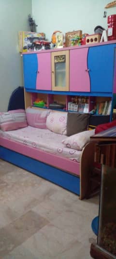 Double bed with cupboards