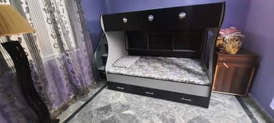 triple story bed in good condition with 3 mattress