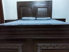 double bed with bedside drawers and mattress