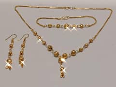 gold plated jewellery 4 pieces ( home delivery be available ha)