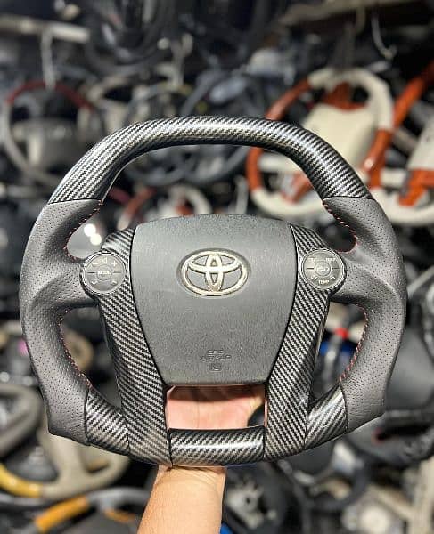 Toyota Prius + Aqua carbon fiber steering available 0