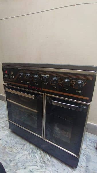 SINGER   gas oven,  5 burners 1