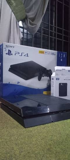 PS4 FAT 1TB NON - JAILBREAK With Box, Games And All Accessories