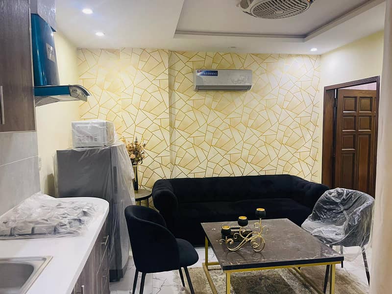 1 BEDROOM FULLY FURNISHED APARTMENT FOR SALE IN SECTOR D BAHRIA TOWN LAHORE 1