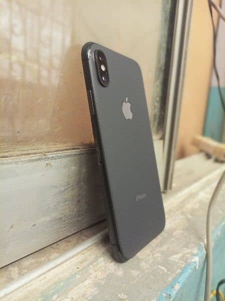 iphone. X  black with charger  64 gb PTA approved 6