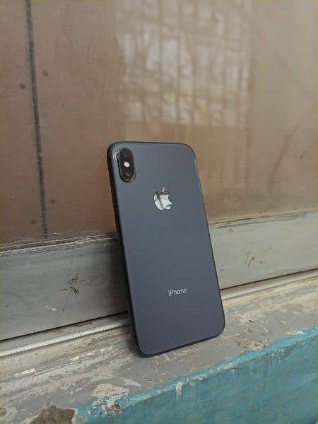 iphone. X  black with charger  64 gb PTA approved 10