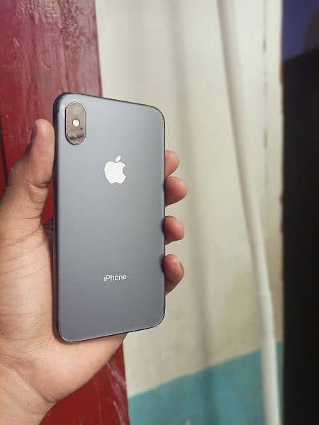 iphone. X  black with charger  64 gb PTA approved 12