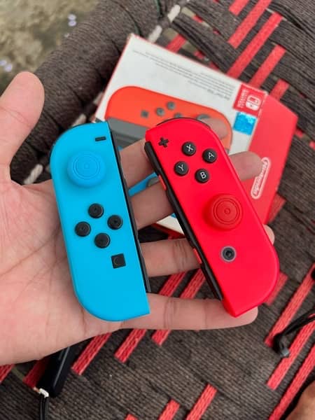 Nintendo Switch Original Joycon Controller Red and Bkue 9