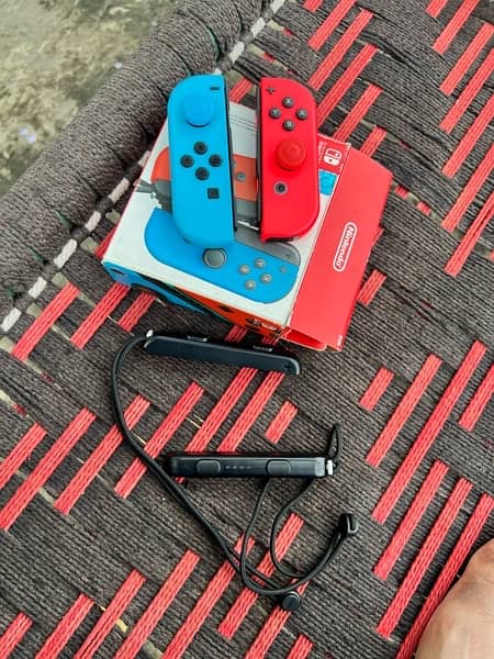 Nintendo Switch Original Joycon Controller Red and Bkue 10