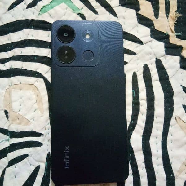 Infinix smart 7hd 5