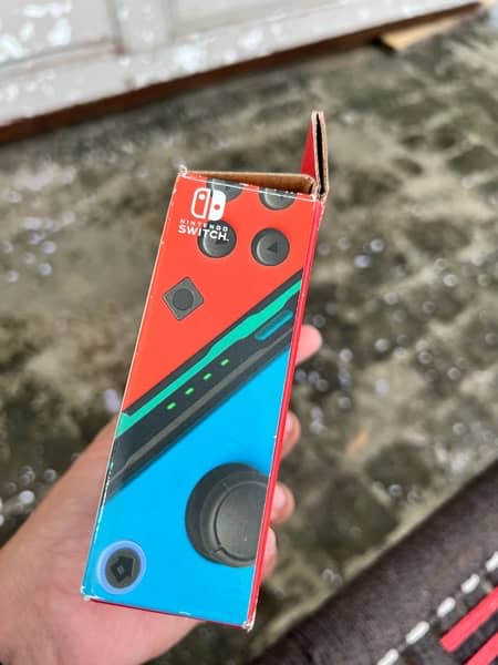 Nintendo Switch Original Joycon Controller Red and Blue 1