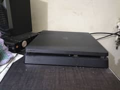 Ps4 slim 1 Tb storage  with 2 original controllers and 4 games